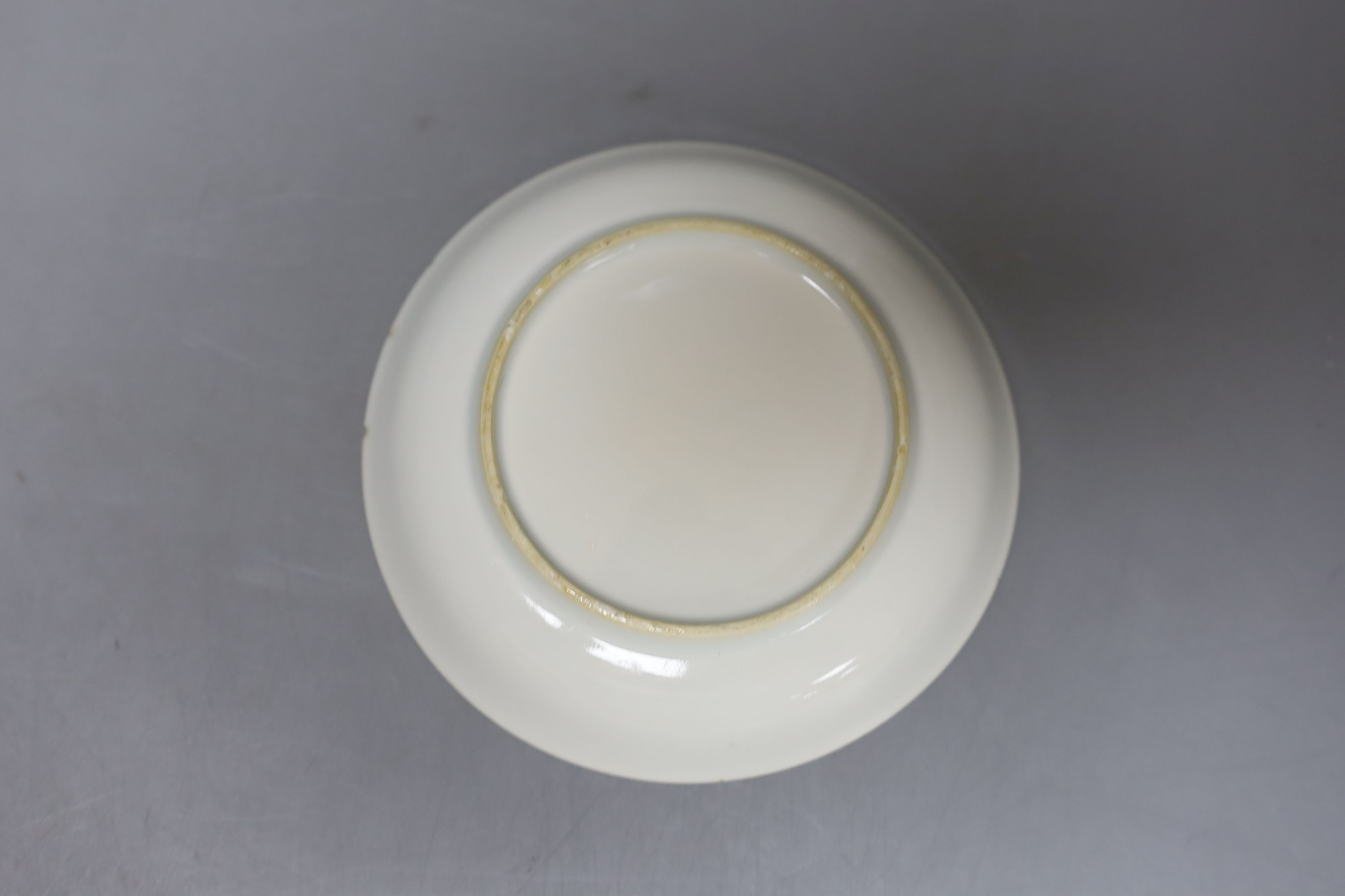 Three Chinese ceramics, including a yellow bowl with inscription to base, 7cm tall, blue and white dragon pattern candlestick mount and export dish